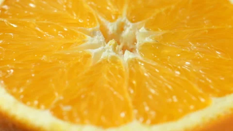 Close up of rotating orange Stock Footage 89805478