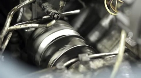 Close-up of rotating part of generator. Clip. Cylindrical part of engine rotates Foto stock