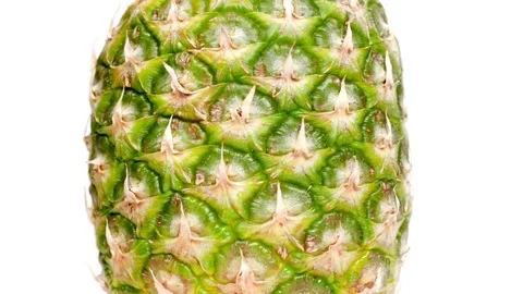 Close up of rotating pineapple Stock Footage 119955679