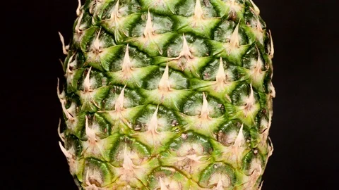 Close up of rotating pineapple Stock Footage 119955976
