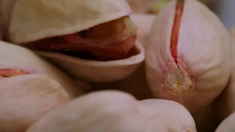 Close-up of rotating pistachios Stock Footage 300385895