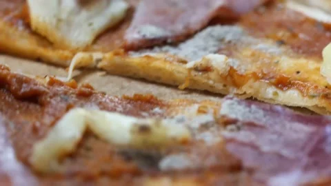 Close up of rotating pizza. chef cooking pizza. hot juicy pizza closeup, Stock Footage 149576657