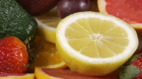 Close-up of a rotating plate with fruit Stock Footage 60189460