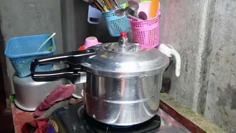 Close up of rotating pressure cooker lid Stock Footage 306760249