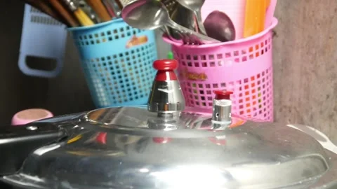 Close up of rotating pressure cooker lid Stock Footage 306760258
