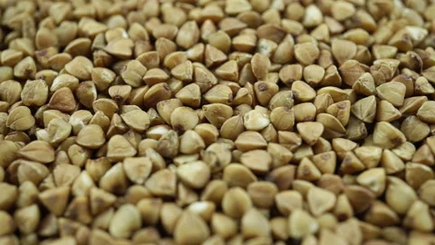 Close-up of Rotating Raw Buckwheat Grains. Stock Footage 225861135
