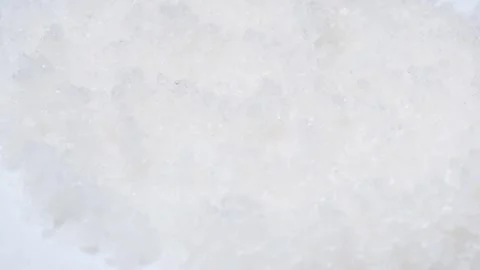 Close up of rotating rock salt. Cooking concept. Table salt Vidéo 257021051