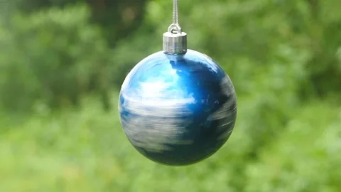 Close rotating shot of blue and white color Christmas ball Stock-Footage 167066412