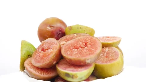 Close rotating shot of slices of figs, Fresh figs slices Stock Footage 148216148