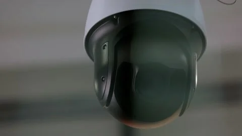 Close-up of rotating surveillance security video camera. Stock Footage 191201010