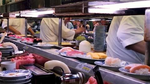 Close up of rotating sushi restaurant in Shinjuku, Tokyo Stock Footage
