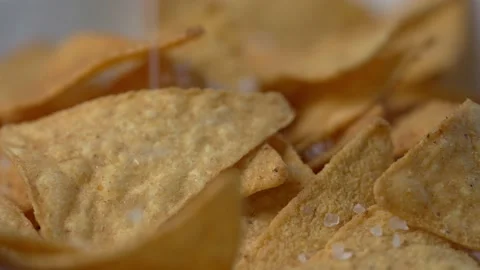 Close up of rotating Tortilla chips. Stock Footage 154265294
