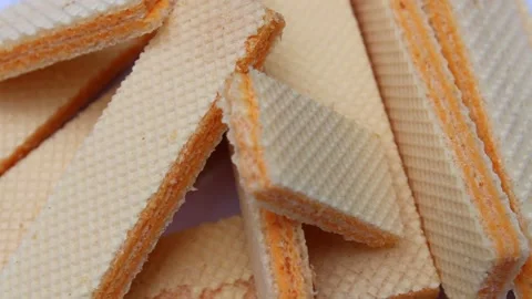 Close Up Rotating Yellow Cheese Wafer Waffle Biscuit Crackers Stock Footage 150235913