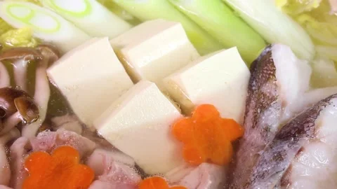 A close up of a rotating yosenabe Stock Footage 324598985