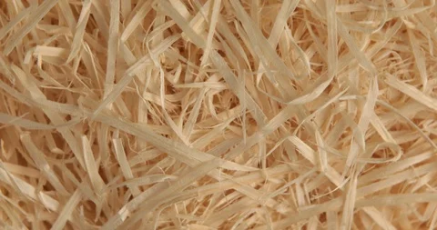 Close-up of the rotation of the background made from wooden chips. Stock Footage 95937769