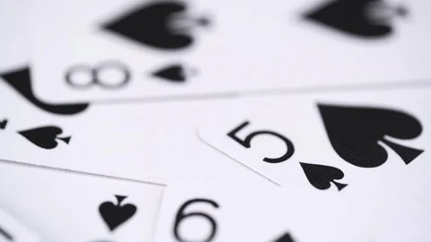Close up rotation of playing cards. soft focus. recreation and entertainment. Stock Footage 247428784
