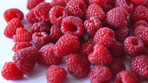 Close-up rotation. Red raspberry spinning on the table Stock Footage 112822973