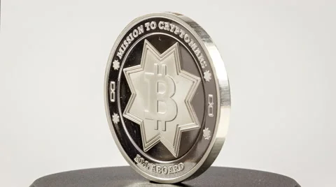 Close-up rotation of silver Bitcoin coin, decentralized crypto-currency Video stock 54950176