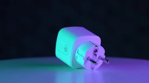 Close up rotation of smart plug. 220V or 110V wifi socket rotating on white Stock Footage 125183380