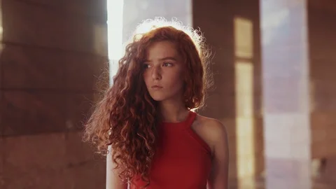 Close up rotation view of attractive young curly redhaired student girl looking Stock Footage 115669379