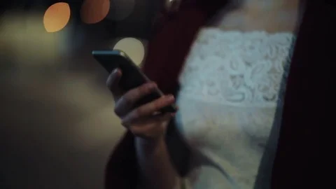 Close up, rotation view of pretty young woman using her smartphone while walking Video stock 84652056