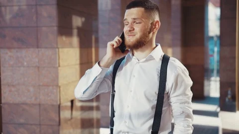 Close up rotation view of serious thoughtful bearded Caucasian young businessman Stock Footage 115667174