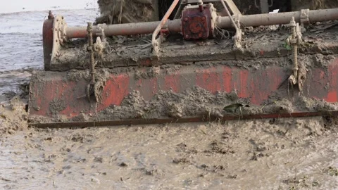 Close-up of the rotavator attached with a tractor Stock Footage 314573526