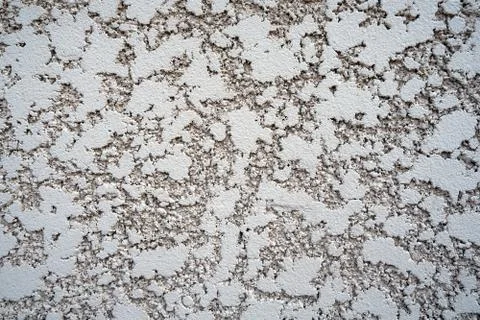 Close-up rough decorative cement plaster on the wall Stock Photos