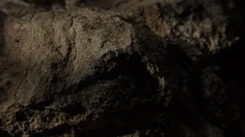 Close-up of rough stone surface with crevices Stock Footage 289843620