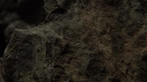 Close-Up of Rough Stone Texture in Dim light Stock Footage 287877261
