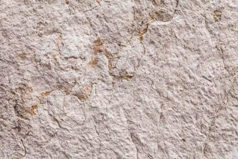 Close Up On Rough Texture Of An Ancient Stone Wall Stock Photos