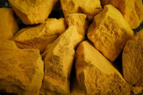 Close-up of rough yellow rocks Fotos de archivo