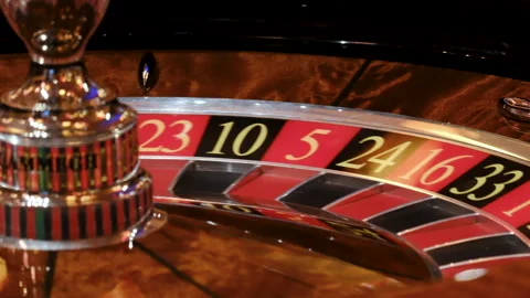Close-Up of a Roulette Wheel in Motion at a Casino Stock-Footage 308847909