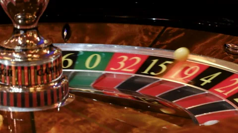 Close-Up of a Roulette Wheel in Motion at a Casino Video stock 308849300
