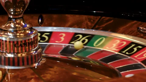 Close-Up of a Roulette Wheel in Motion at a Casino Видео 308849432