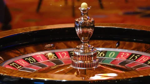 Close-Up of a Roulette Wheel in Motion at a Casino Video stock 308852232