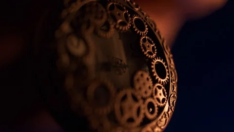 Close-up of a round clock with a carved lid on which the beam moves. Video stock 111769973