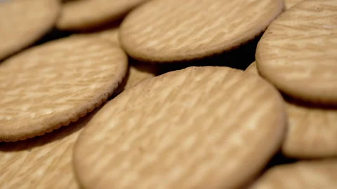 Close up, Round Crispy Shortbread Cookies Rotate on a Turntable, Background Stock Footage 241789197