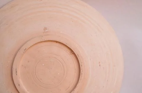 Close up of round earthenware bottom copy space Stock Photos