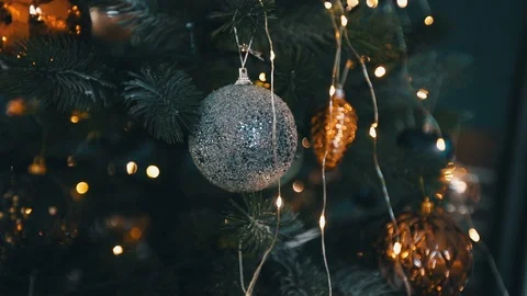 Close up round move of fir tree with toys and garlands Video stock 121531457