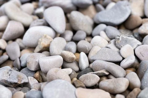 Close-up of round pebbles on beach Stock Photos