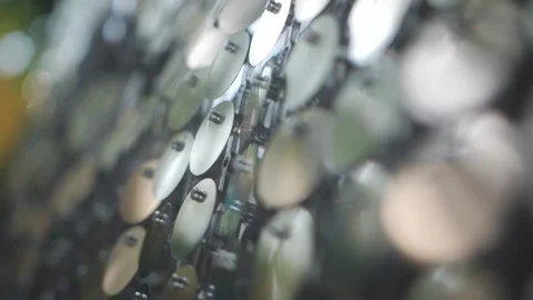 Close-up round silver sequins shimmer in the sunlight. Stock Footage 158709731