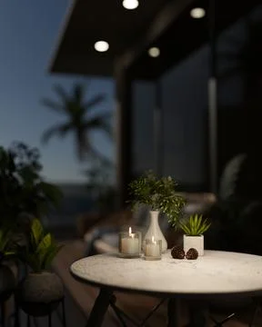 A close-up of a round table with decorative objects on a balcony at night w.. Stock Photos