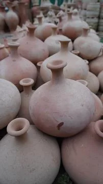 Close up of rounded terracotta pots with rustic textures Stock Photos