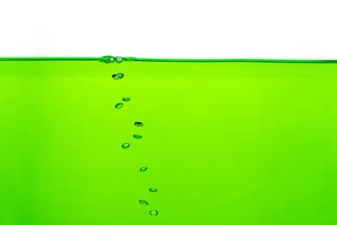 Close up to row of  air bubble , green water on white background. Stock Photos