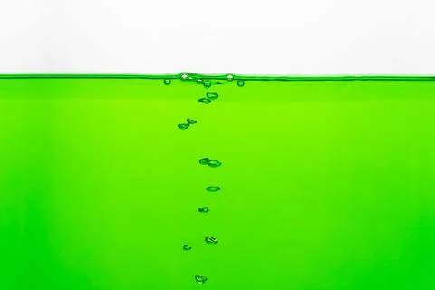 Close up to row of  air bubble , green water on white background. Stock Photos