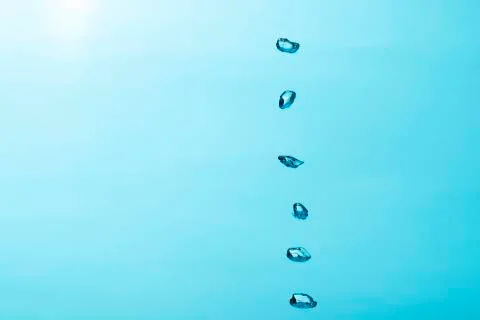 Close up to row of  air bubble , isolated on blue background. Stock Photos