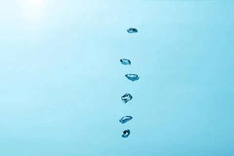 Close up to row of  air bubble , isolated on blue background. Stock Photos