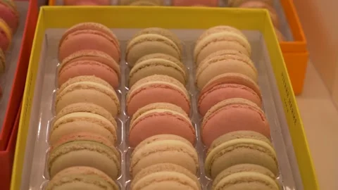 Close up row of fresh colors and different taste macaroons. Panning 4K Video stock 178498917