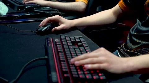 Close-Up On Row Of Gamer's Hands On A Keyboard, Actively Pushing Buttons. Stock Footage 147384419